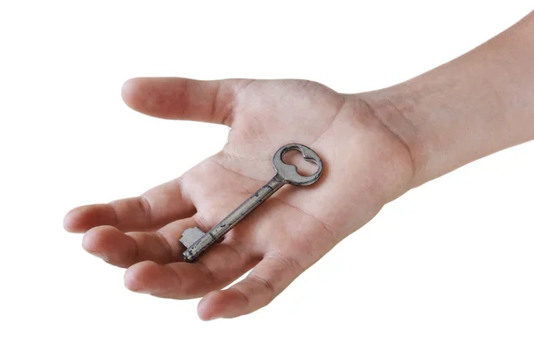 Hand met een sleutel. — Stockfoto