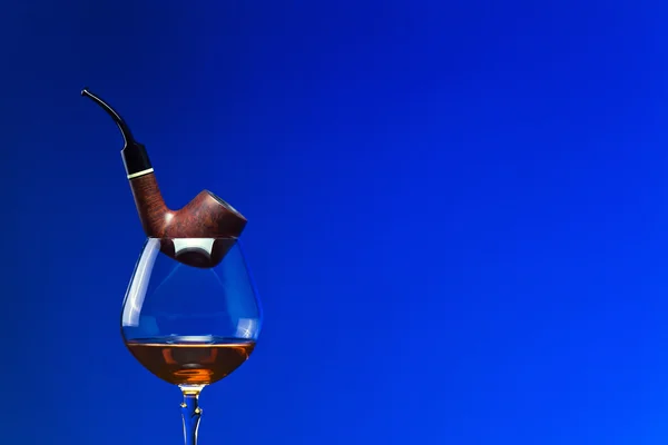 Cognac and pipe — Stock Photo, Image