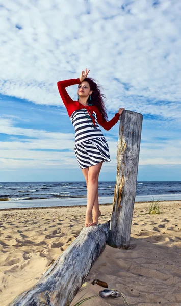 Young woman on a beach — Stock Photo, Image