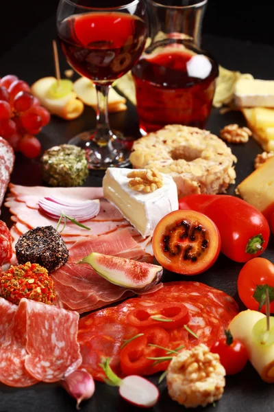Antipasto catering platter with red wine — Stock Photo, Image