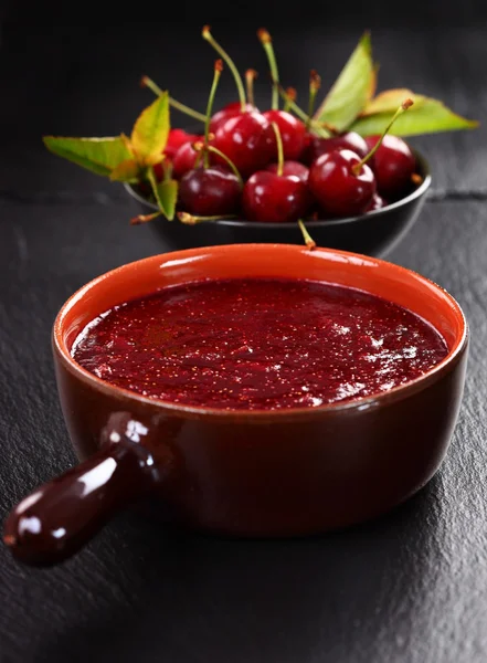 Homemade cherry jam with wild strawberries — Stock Photo, Image