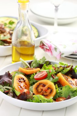 Salad with tamarillos clipart