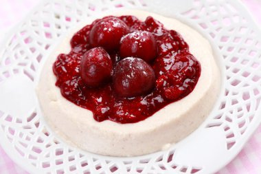 Semolina pudding with homemade jelly clipart