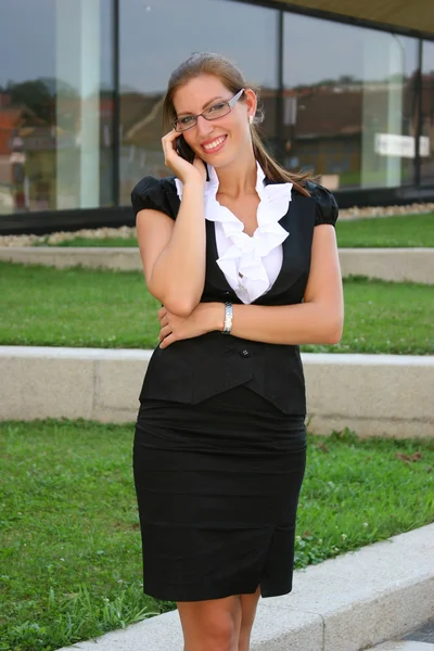 Mulher de negócios na cidade — Fotografia de Stock