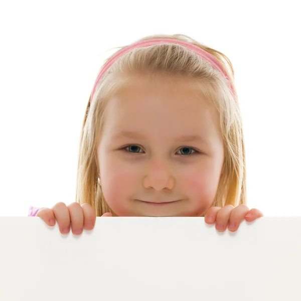 Beyaz tahta arkasındaki küçük kız — Stok fotoğraf