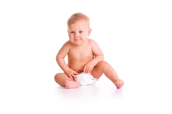Студийный снимок ребенка в подгузнике — стоковое фото