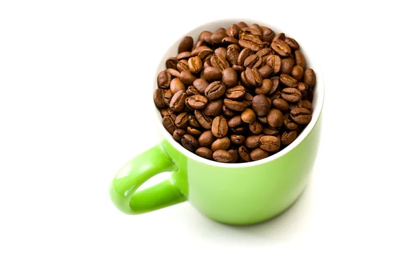 Renkli kupa kahve çekirdekleri ile — Stok fotoğraf
