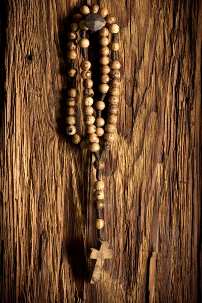 Wooden rosary beads hanging — Zdjęcie stockowe