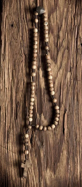 Wooden rosary beads hanging — Stock Photo, Image