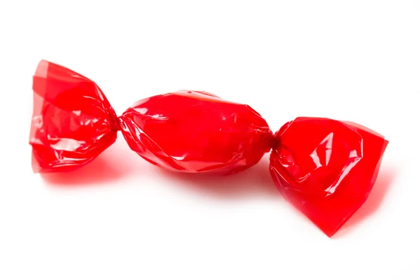 Red candy wrapped in foil — Stock Photo, Image