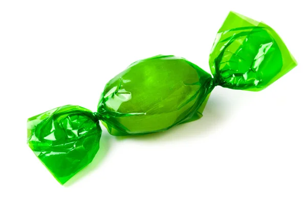 Green candy wrapped in foil — Stock Photo, Image