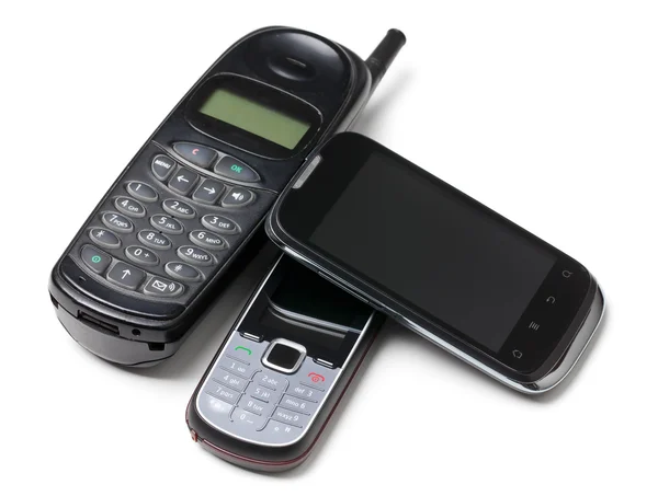 Drie generatie mobiele telefoons — Stockfoto