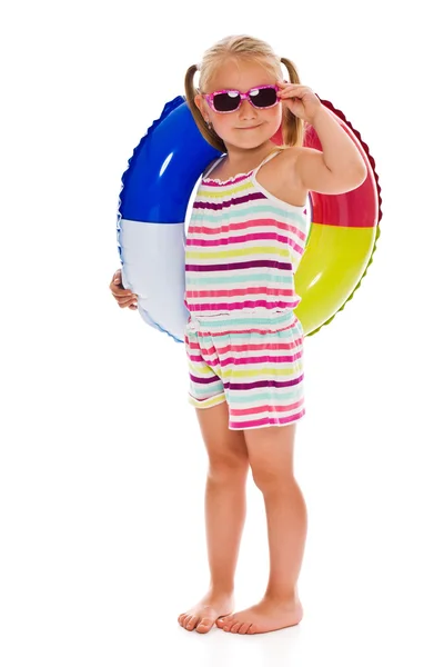 Little girl with sunglasses and inflatable ring — Stock Photo, Image
