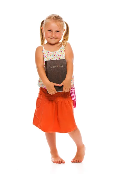 Liten flicka med Bibeln — Stockfoto