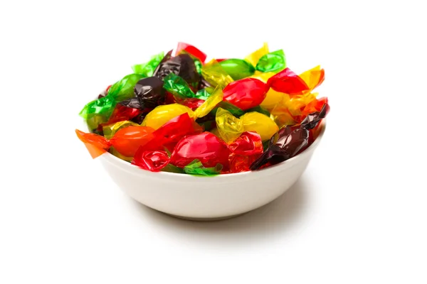 Farbige Bonbons in Folie gewickelt — Stockfoto