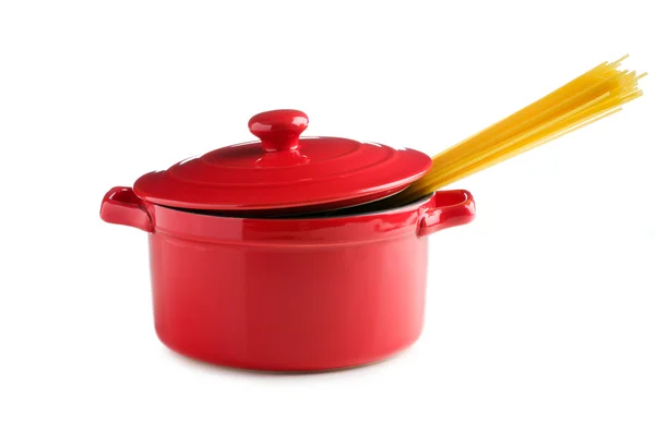 Spaghetti in a red pot — Stock Photo, Image