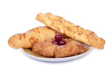 Set of puff pastry on plate. clipart