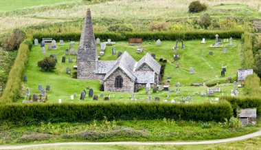 Small English church and grave yard clipart