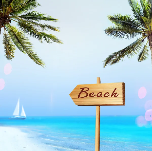 Sign and beach — Stock Photo, Image