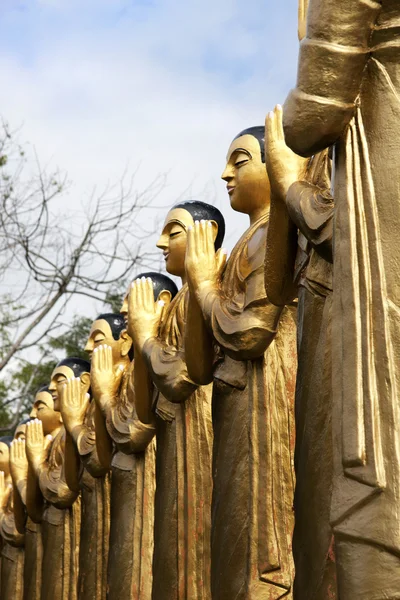 Golden monks — Stock Photo, Image