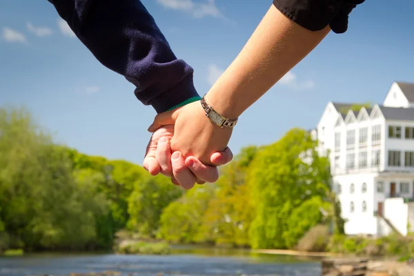Holding hands together — Stock Photo, Image