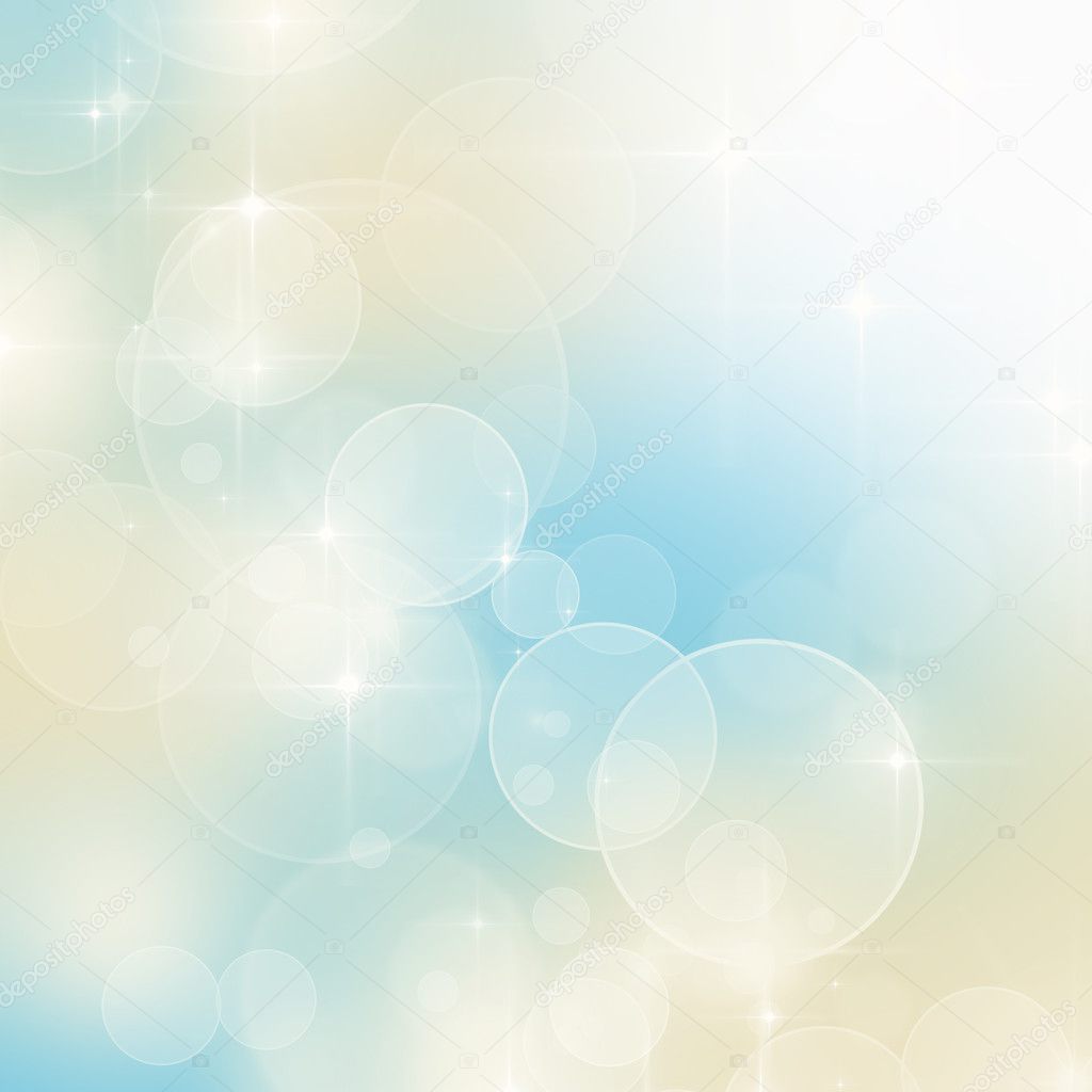 Abstract blue and beige bokeh background with copy space