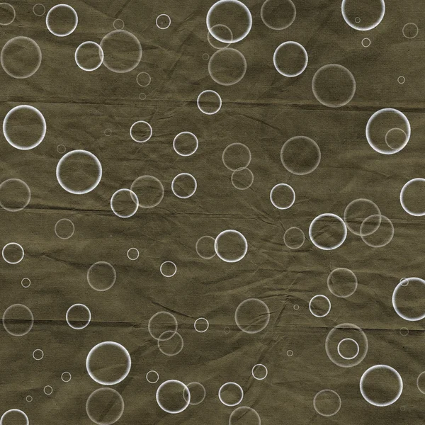 Gamla skrynkliga brunt papper bakgrund med cirklar — Stockfoto