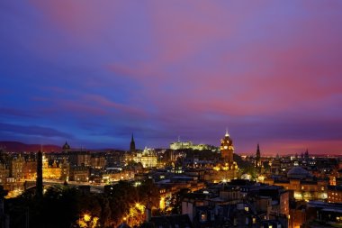 Sunset over night Edinburgh, Scotland clipart