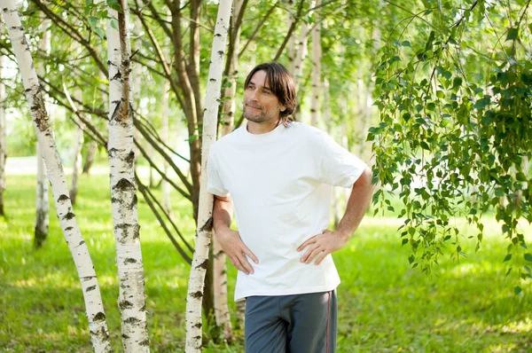 Middle-aged man in a park — Stock Photo, Image