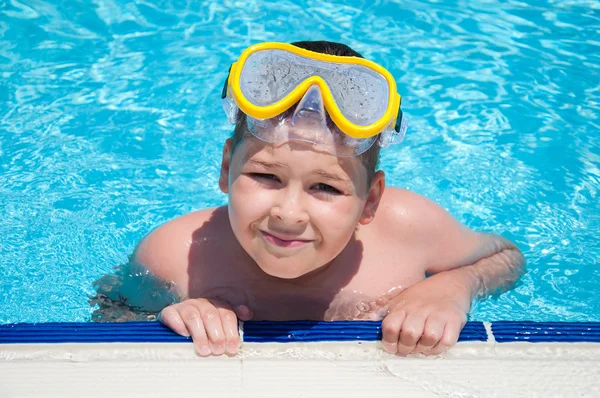 stock image Boy with a mask for snorkeling in the pool