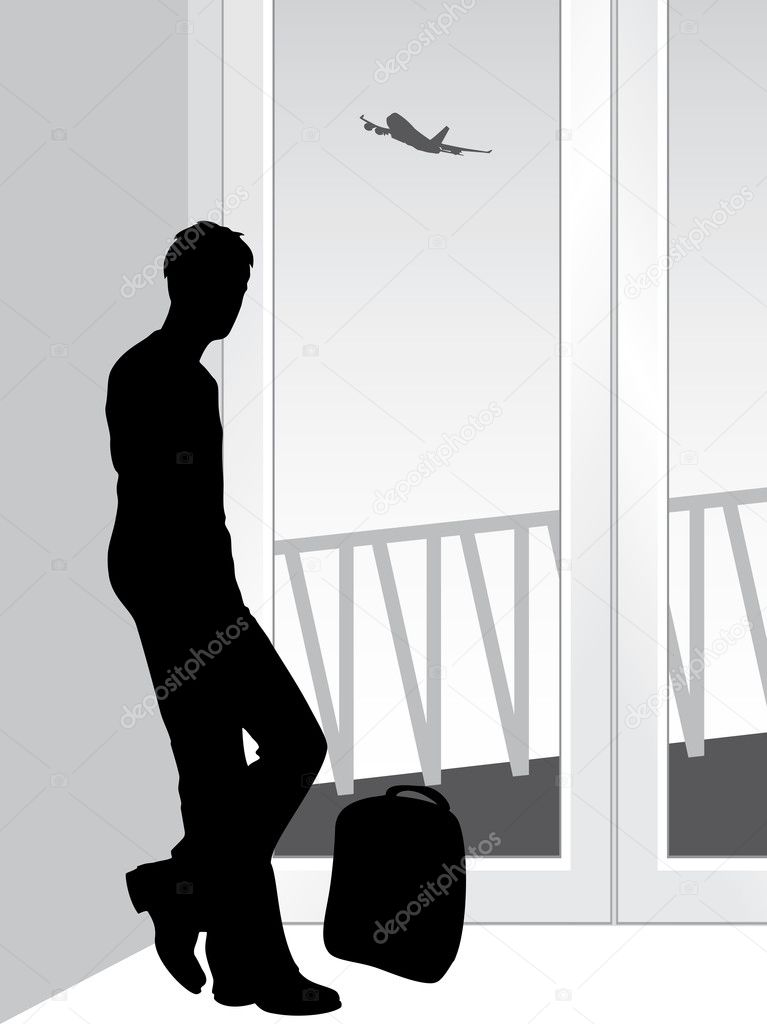 Silhouette of a traveler in anticipation of landing the airplane