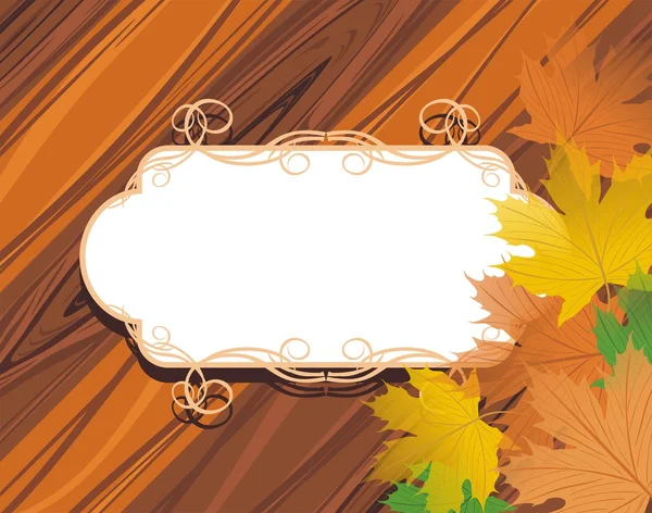 Декоративна рамка з кленовим листям на дерев'яному тлі — стокове фото