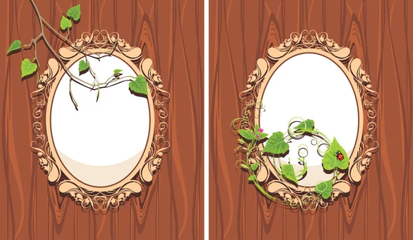 Ornamental frames with sprigs on the wooden background — Stock Vector