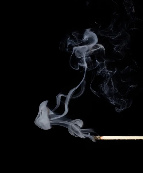 Match in the smoke — Stock Photo, Image