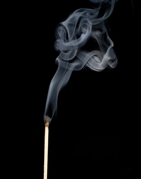 Спичка в дыму Лицензионные Стоковые Фото