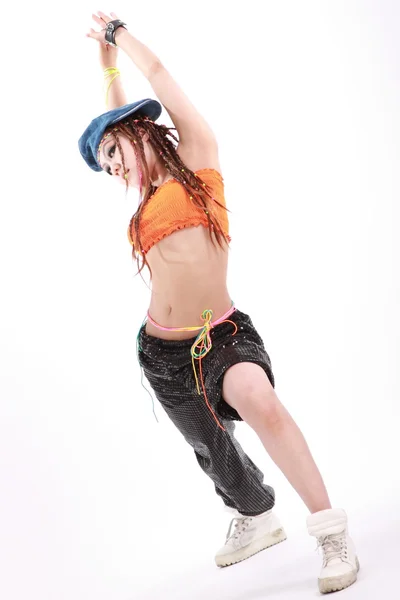 Aranyos lány a különböző tánc jelmezek és szórakozást jelent. — Stock Fotó