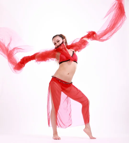 Žena v různých tanečních kostýmů a zábava představuje. — Stock fotografie
