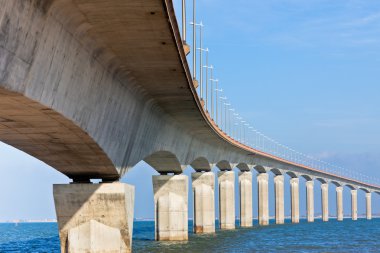 Curved Bridge over the water clipart