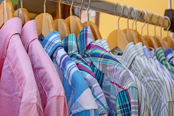 stock image Mix color Shirt and Tie on Hangers , selling