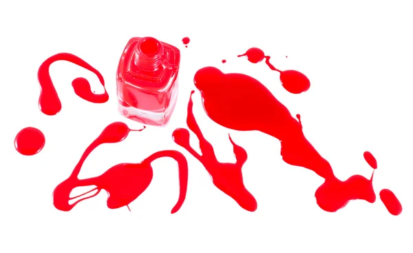 Esmalte de uñas rojo y botella en blanco — Foto de Stock