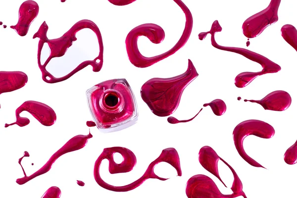 Röda nagellack flaska med stänker isolerad på vit bakgrund — Stockfoto