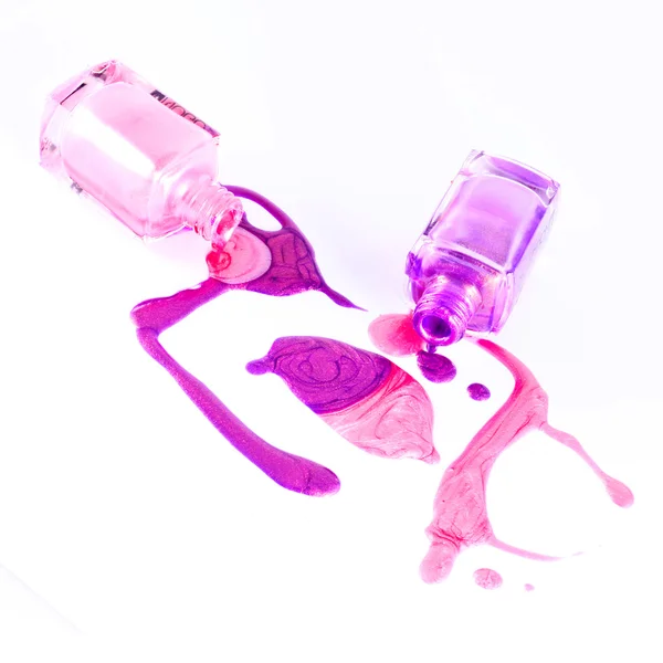 Pink and violet nail polish isolated — Stock Photo, Image