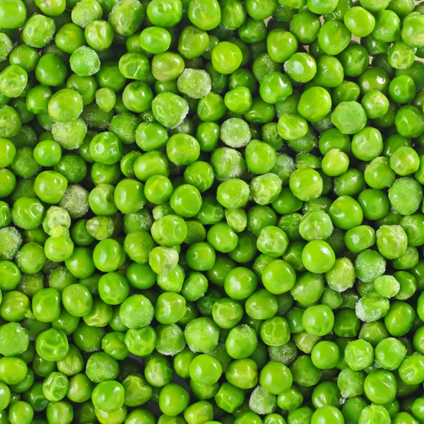 Cáscara fresca madura guisantes verdes fondo —  Fotos de Stock