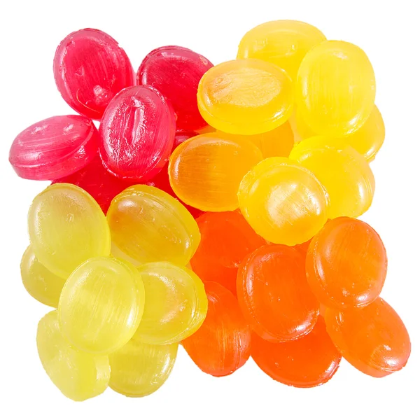 하얀 배경에 있는 다채 로운 색깔의 사탕 — 스톡 사진