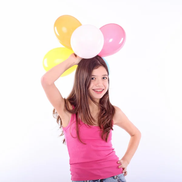 Teenager Mädchen mit bunten Luftballons — Stockfoto