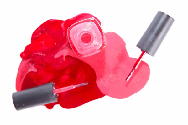 Пляшка рожевого лаку для нігтів ізольована — стокове фото