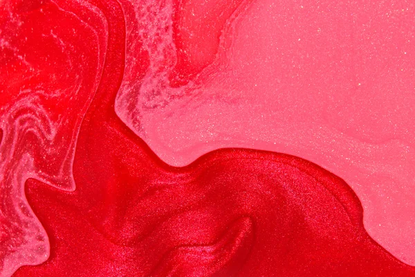 Abstrakter Hintergrund mit rosa und rotem Nagellack — Stockfoto