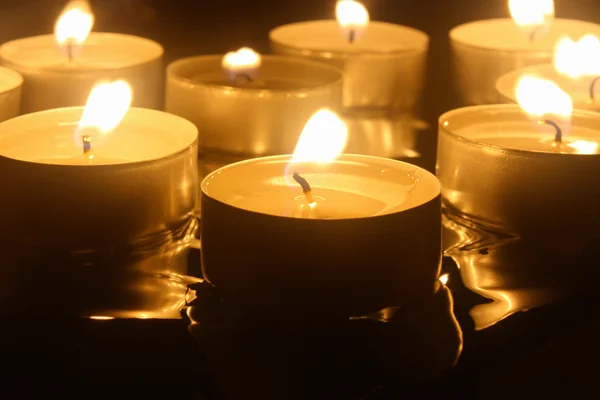 Close up view of the candles cutting through the darkness — Stock Photo, Image
