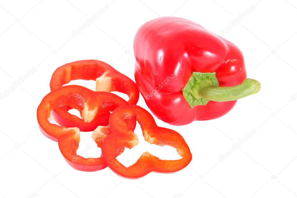 Red paprika and slices isolated on the white background
