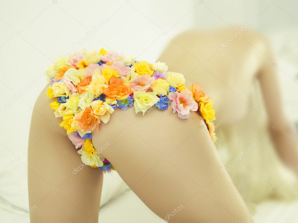 Lady in floral bikini - Stock Photo, Image. 